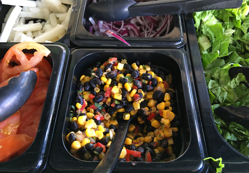Black bean and corn salad in salad bar