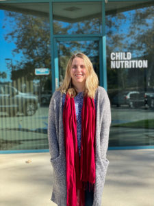 Photo of Julie Cockrum outside of the Child Nutrition Services office