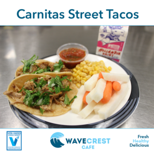 Photo of carnitas street tacos with fresh fruits & vegetables