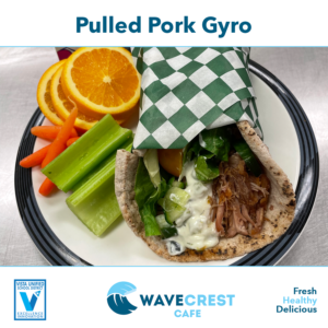 Photo of a pulled pork gyro with fresh fruits & vegetables