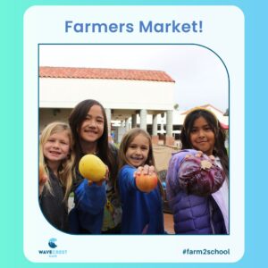 Four students at a WaveCrest Cafe Farm 2 School Farmers Market event at THE Leadership Academy in Vista Unified School District